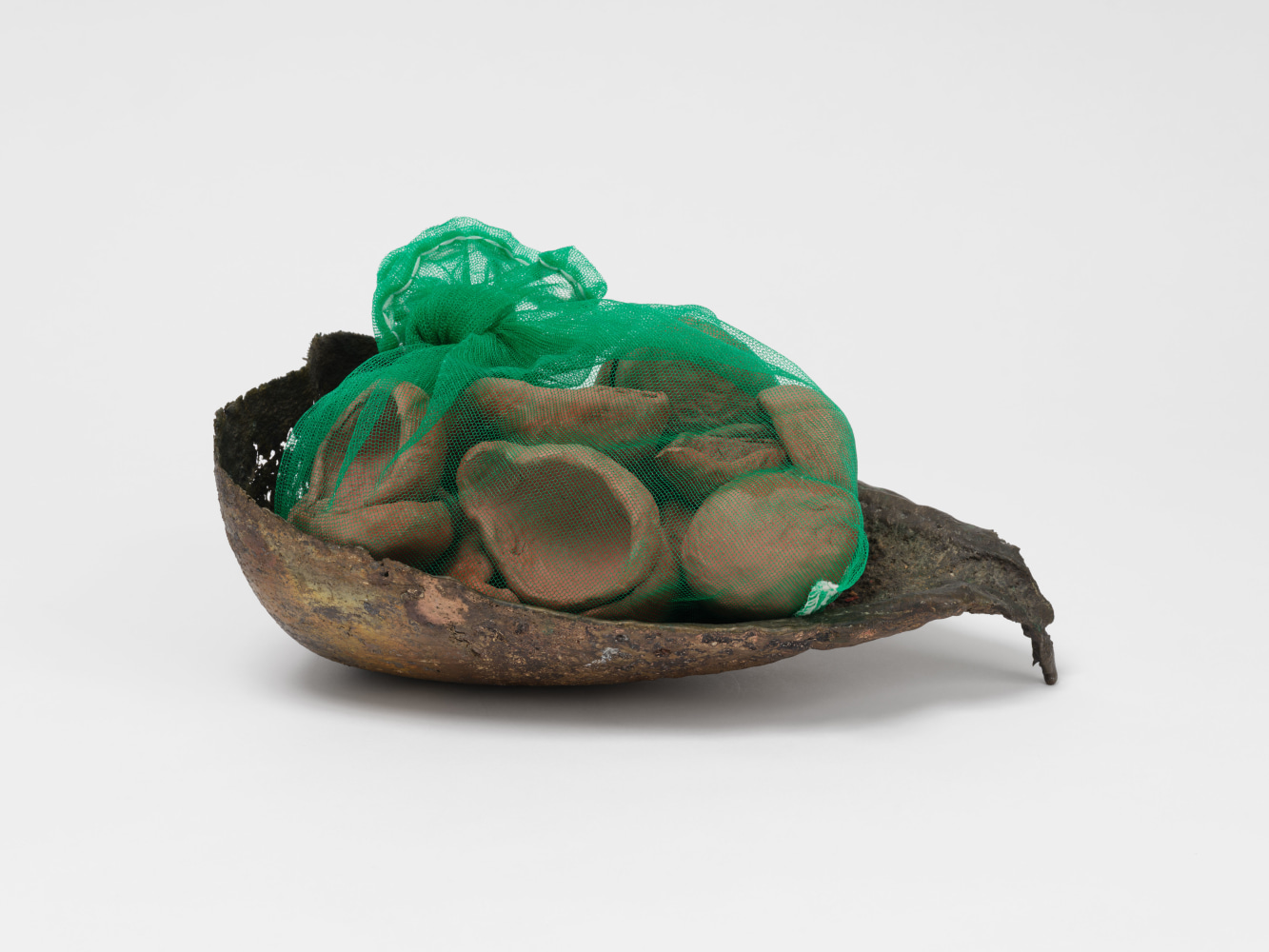 Veronica Ryan Crucible, mid-1990s/2023 bronze, garden net, clay 8 3/4 x 15 1/4 x 10 in. (22.2 x 38.7 x 25.4 cm)