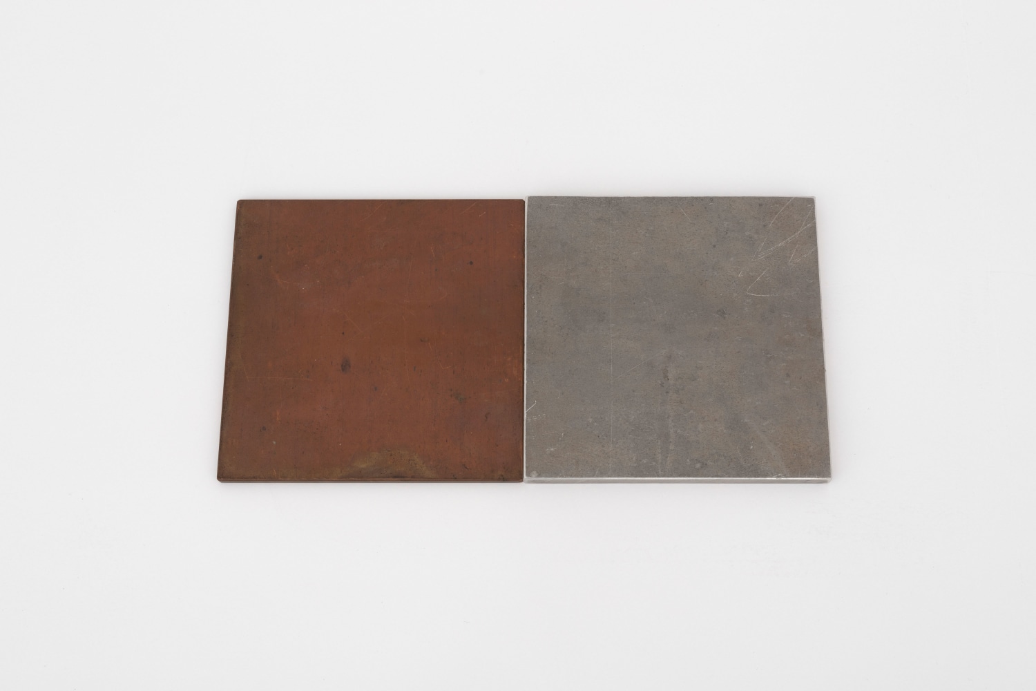 Carl Andre CuAl Joint, 2018 copper and aluminum copper: 1/8 x 6 x 6 in. (.3 x 15.2 x 15.2 cm) aluminum: 3/8 x 6 x 6 in. (1 x 15.2 x 15.2 cm) overall: 3/8 x 6 x 12 in. (1 x 15.2 x 30.5 cm)