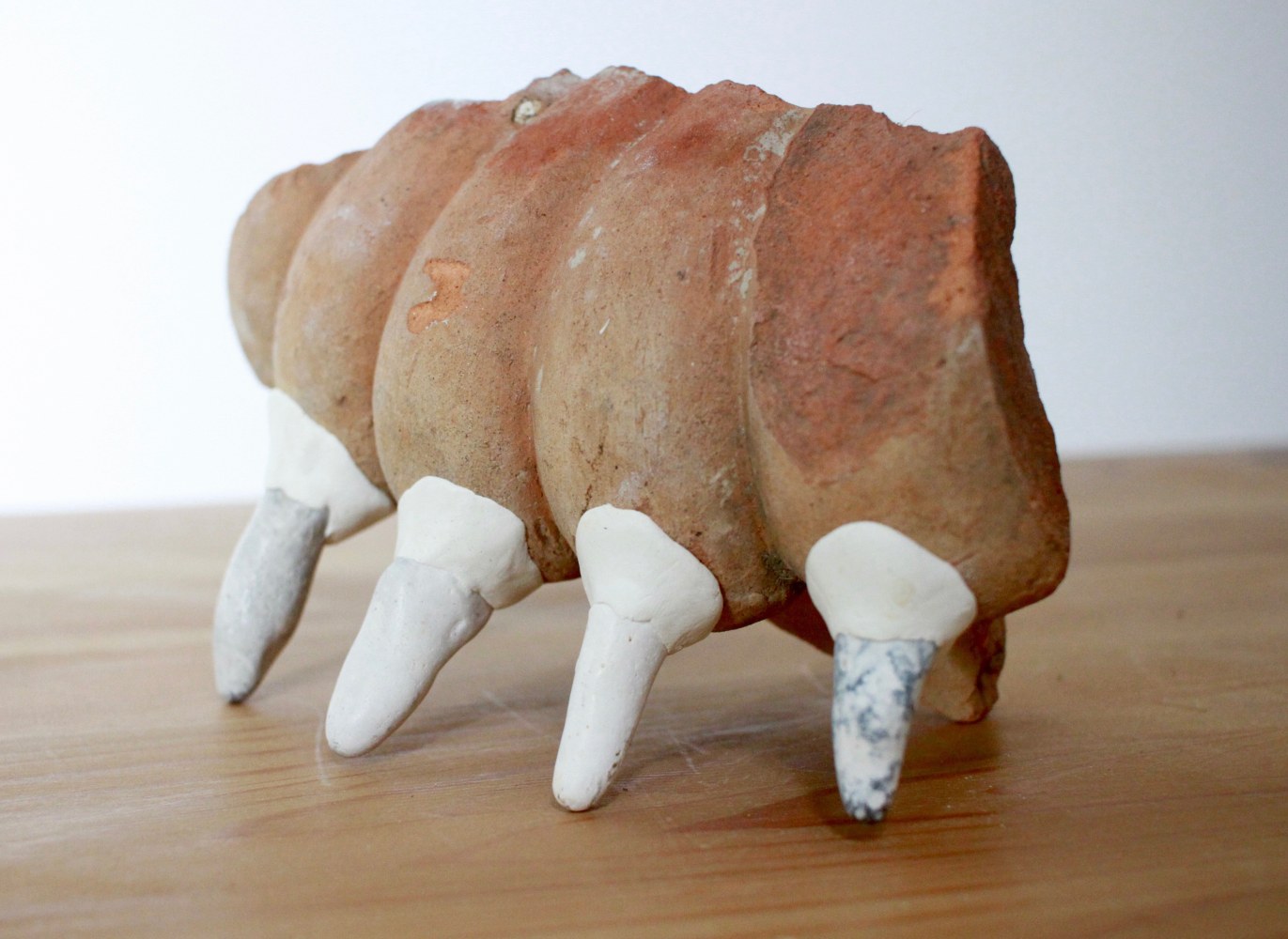 Untitled tiger I 2008, found stones, terracotta, milliput 17.5 x 12 x 10 cm