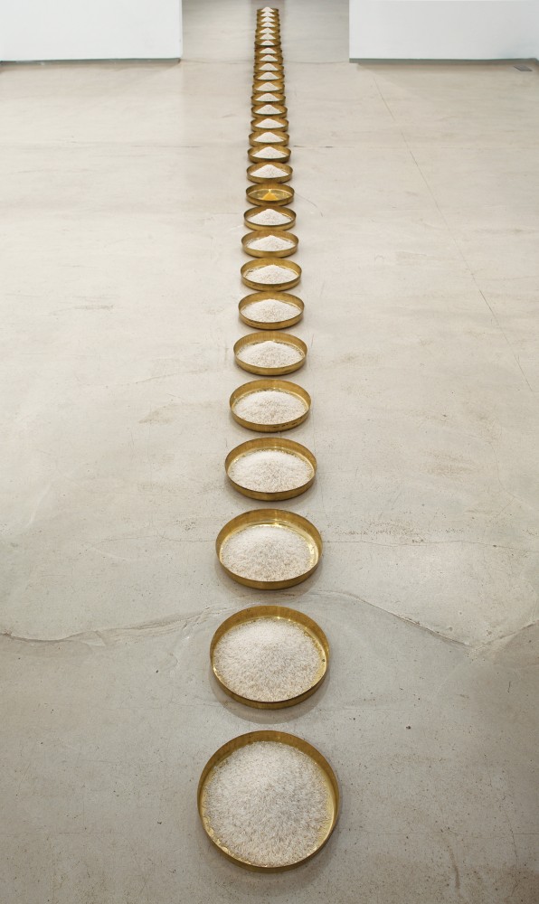 The Rice Meals, 1993, brass plates, rice and hazelnut pollen, 911 x 25 cm