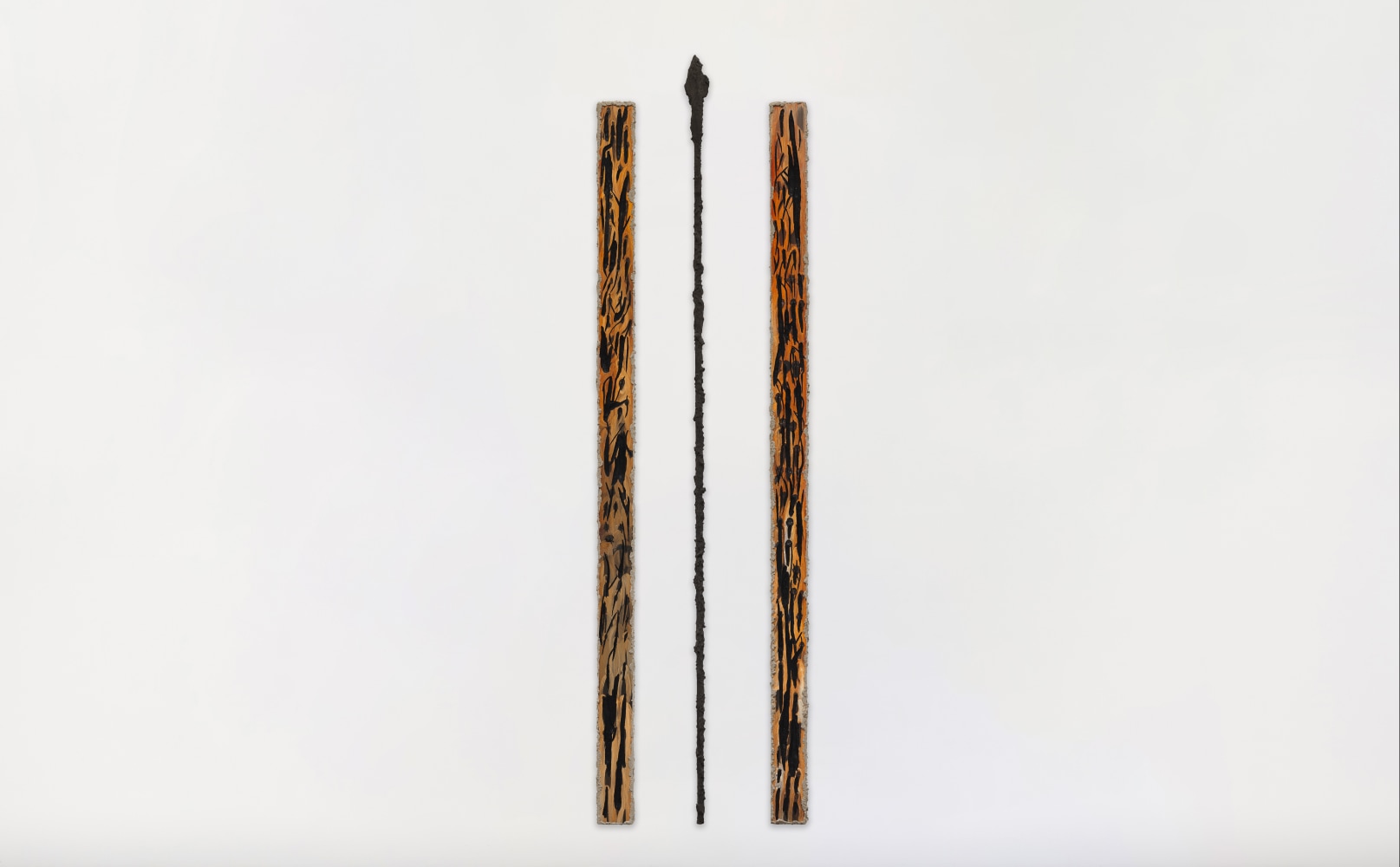 Rift, 2025

Acrylic, carving and casting powder on wood | Casting powder on iron

Wood panels: 74.8 x 3.5 inches / 190 x 8.8 cm each

Iron spear: 80 inches / 203 cm (height)