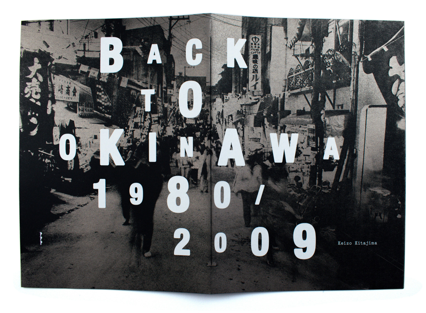 Back to Okinawa 1980/2009
Keizo Kitajima,&amp;nbsp;2009

Newsprint; silkscreened black wrappers; hand-sewn binding; clear plastic bag
Folio
Limited edition of 250 copies, signed and numbered
$300

Printed and Published by PPP Editions

PURCHASE
