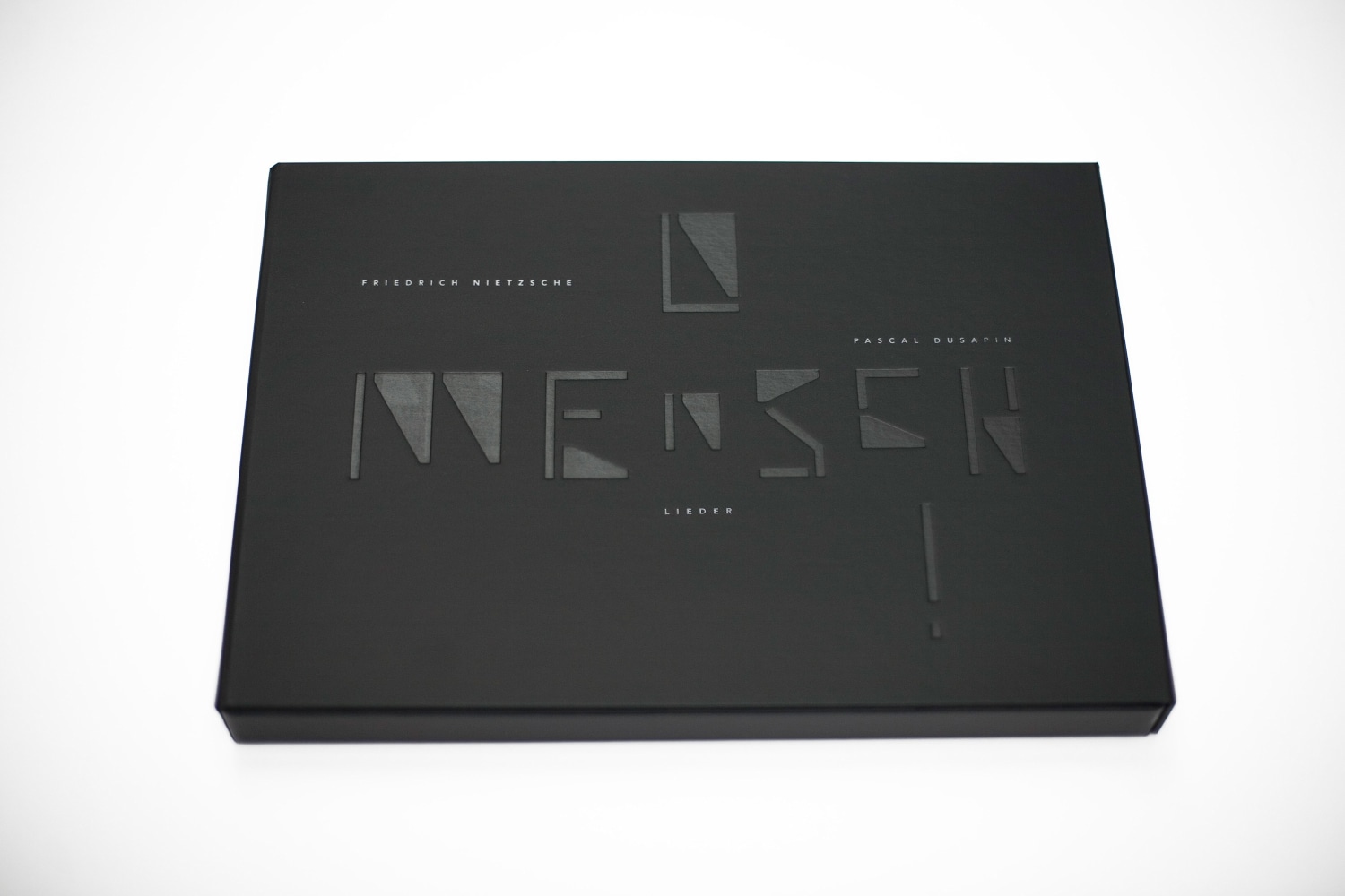 O Mensch!
Pascal Dusapin, 2011

Musical creation on Friedrich Nietzsche&amp;rsquo;s poetry, performed on November 15th, 2011 at the
Th&amp;eacute;&amp;acirc;tre des Bouffes du Nord in Paris
Art box conceived by Philippe Apeloig
10&amp;quot; x 13.7&amp;quot; x 1&amp;quot;

Edition of 133 which includes the facsimile of Pascal Dusapin&amp;rsquo;s original music score, as well as a portfolio of nine documents:
- 111 numbered and signed copies. The 30 first come with an original photograph of Pascal Dusapin, signed for the patrons
- 11 numbered artist proofs, signed and annotated &amp;lsquo;ea&amp;rsquo; (&amp;lsquo;&amp;eacute;preuves d&amp;rsquo;artistes&amp;rsquo;)
- 11 proofs &amp;lsquo;hors commerce&amp;rsquo; numbered, signed and annotated &amp;lsquo;hc&amp;rsquo;
$1400 (Pre-tax)

Printed and published by Idem Paris

INQUIRE