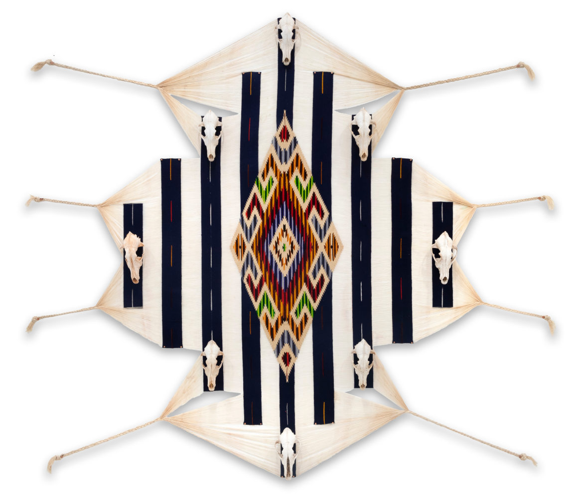 Kelly Tapia-Chuning

voicing the silenced; we survive you, 2024

dismantled serape, reclaimed coyote skulls from a coyote &amp;ldquo;dump&amp;rdquo; site in southern Utah, copper nails, interfacing

70 x 77 x 3 in.
177.8 x 195.6 x 7.6 cm.

(TAPI001)