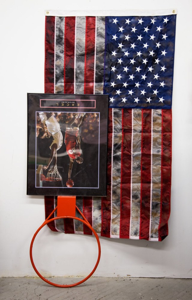 Rindon Johnson
Excel, 2016
inspirational poster, basketball rim, spray painted American Flag
6 feet x 4 feet x 4 inches
Courtesy of the Artist and Fort Gansevoort