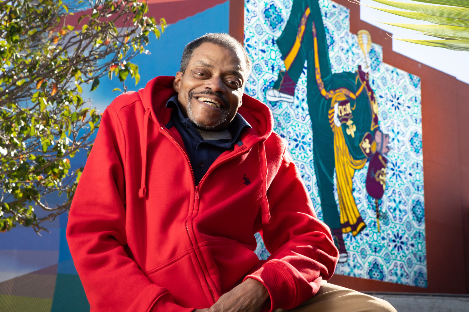 Artist Keith Duncan stands in front of his &amp;quot;Drum Major of NOLA&amp;quot; mural at The Ogden Museum of Southern Art.
Photo by: Crista Rock