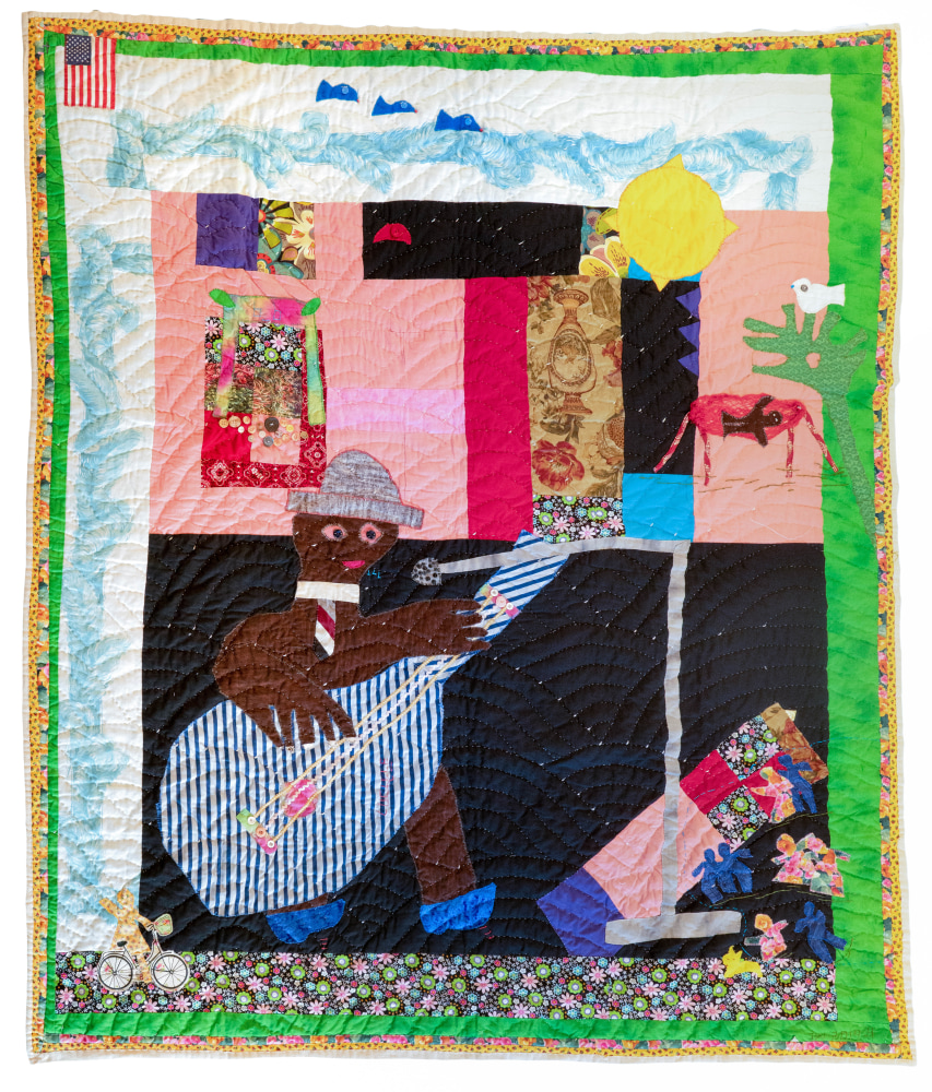 A quilt of a figure playing a three stringed instrument under the sun