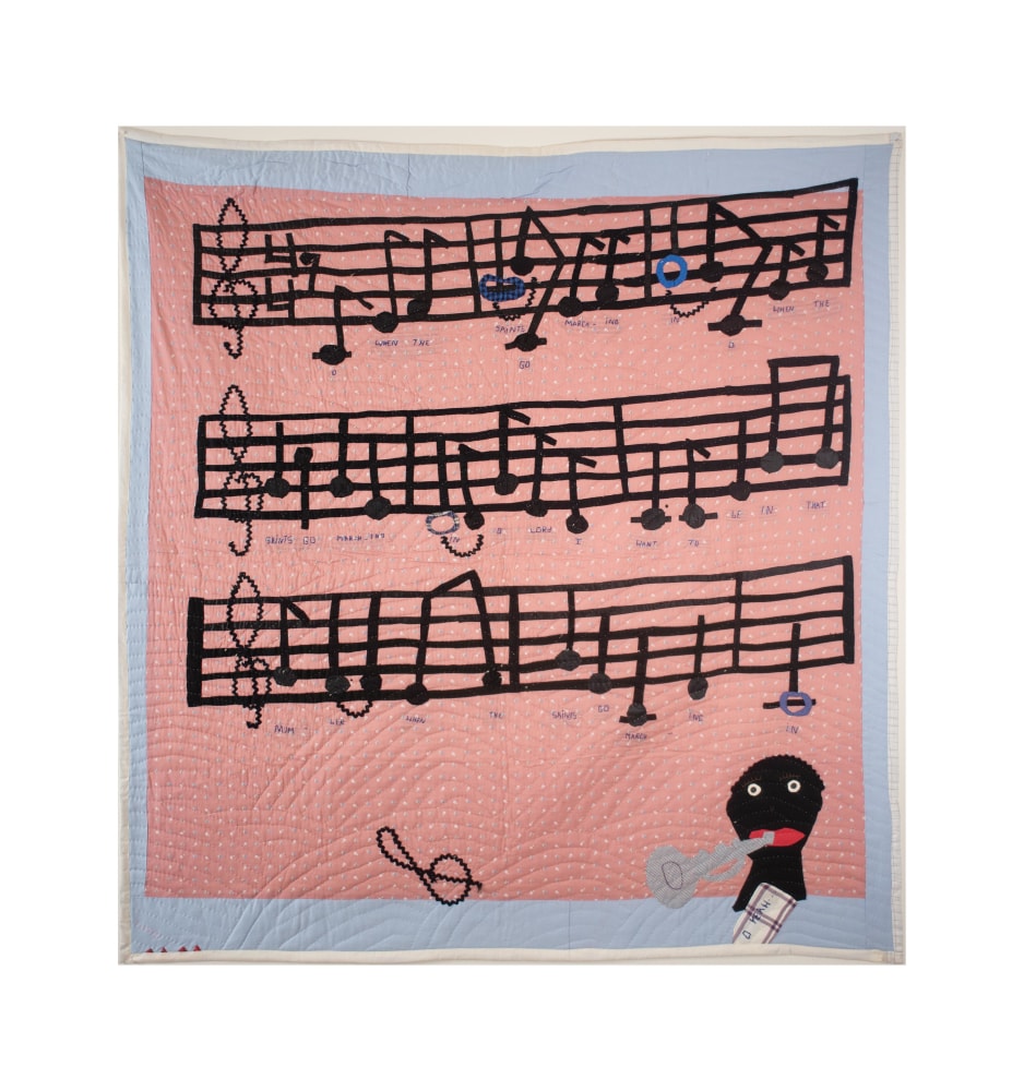 A quilt of musical bars and notes with a trumpet player in the bottom right corner