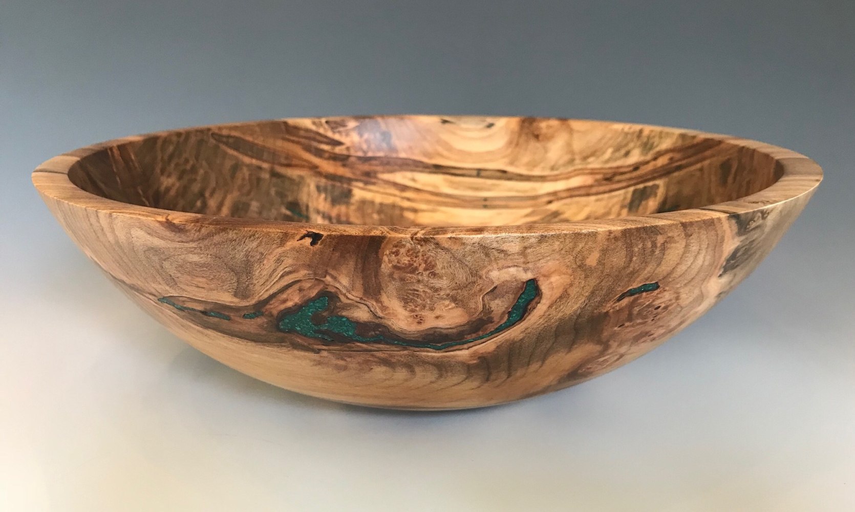 Ambrosia Maple Bowl with Inlayed Chrysocolla Stone 

Wood

4.5&amp;quot; x 14&amp;quot; x 14&amp;quot;