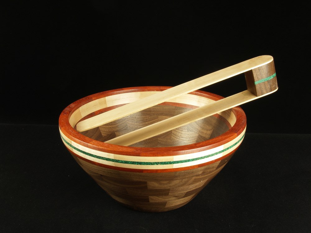 Walnut/Malachite Salad Bowl
Wood
11&amp;quot; x 5&amp;quot; x 11&amp;quot;
2019
A contemporary salad bowl of Walnut with Maple and Padauk rings. Malachite stone embedded in the Padauk ring as an accent feature.