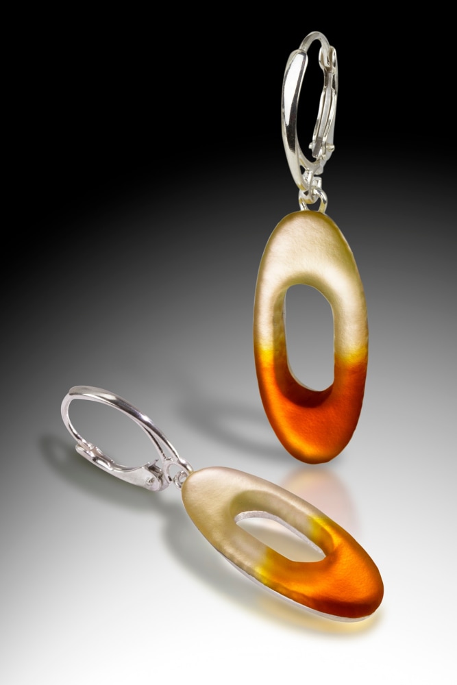 Oval Earrings 

Lead crystal and silver

1.5&amp;quot; x .5&amp;quot; x .5&amp;quot;