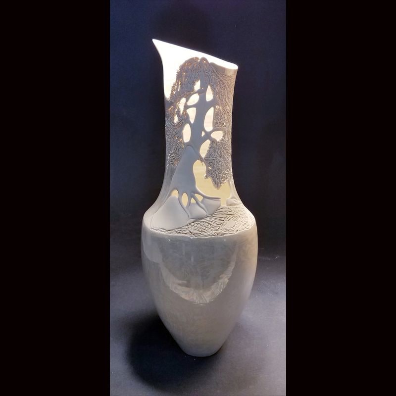 Lebanon Cypress Vase&amp;nbsp;

Porcelain&amp;nbsp;

16&amp;quot;x4&amp;quot;x4&amp;quot;