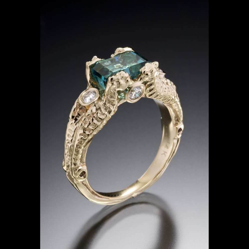 Seahorse Ring

.50&amp;quot; x 1.75&amp;quot; x .25&amp;quot;

14k gold hand carved seahorse ring with 2ct blue green tourmaline and diamonds

2021

&amp;nbsp;

&amp;nbsp;