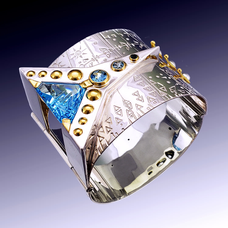Circuit cuff 17c
Blue topaz in sterling silver and 18k gold
2.5&amp;quot; x 2&amp;quot; x 2&amp;quot;
2019