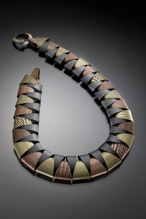 PN4 TRI
brass tubing cut, textured, electroplated and enameled then constructed
18&amp;quot; x 1&amp;quot; x 1&amp;quot;
2018
