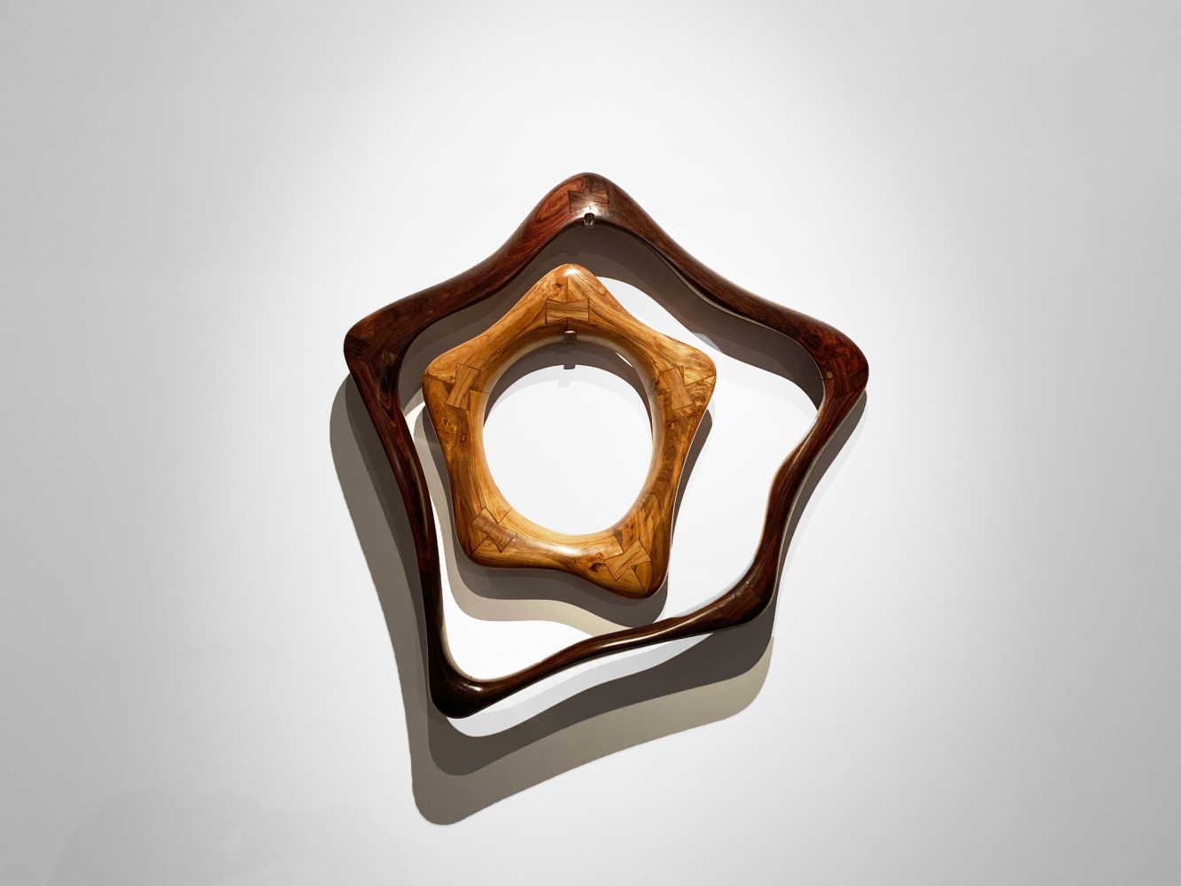 In your arms, 2021
Teak and rosewood
39.5&amp;quot; x 40.37&amp;quot; x 7.5&amp;quot;
TG# 4405