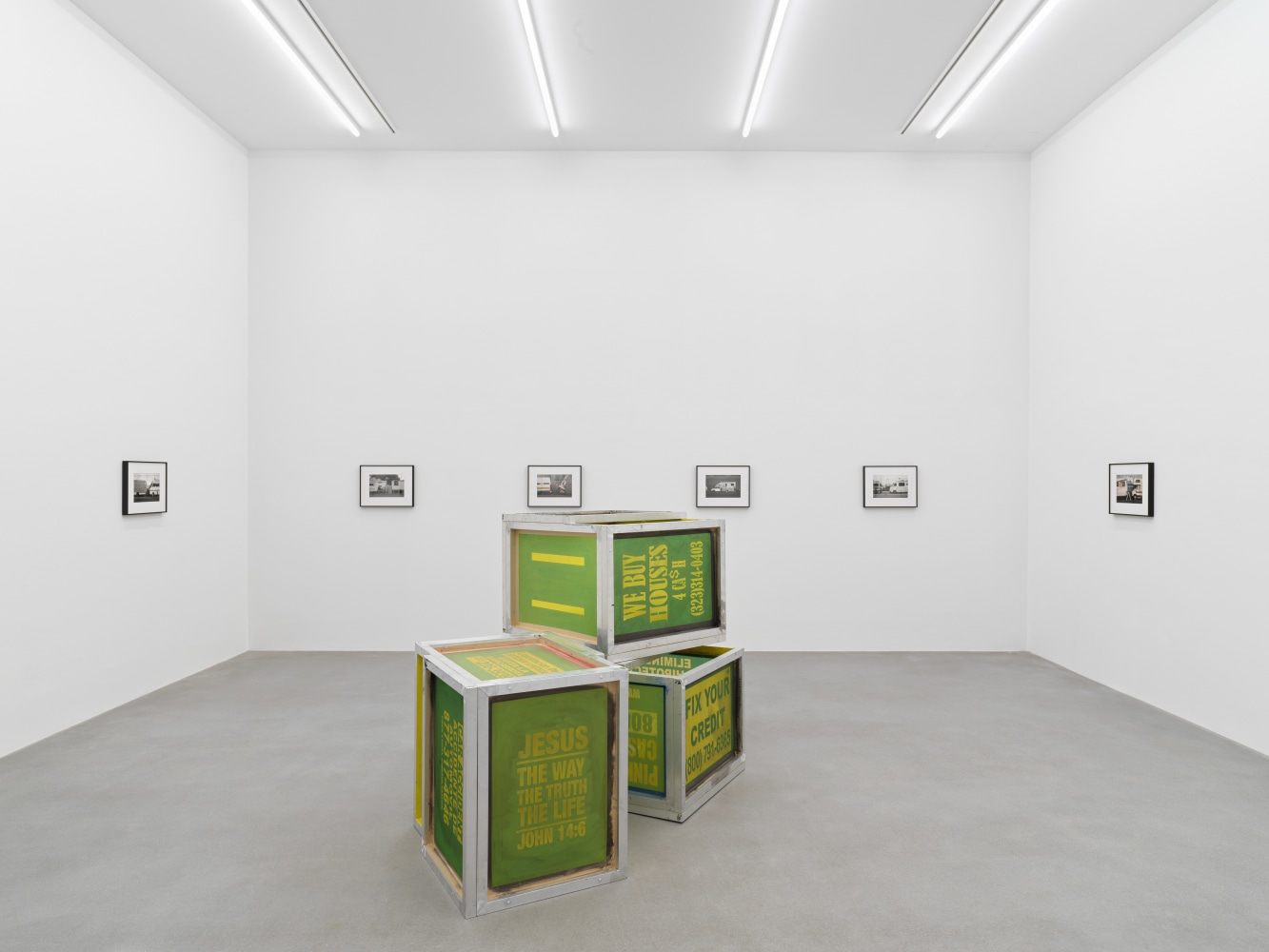 Installation view of Walead Beshty collage, photography, and sculpture exhibition