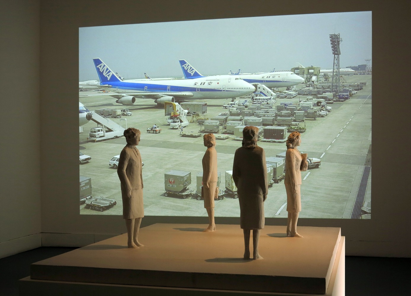 Installation view of video work and sculptures by Peter Fischli and David Weiss