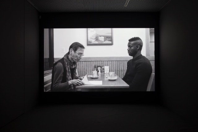 Installation view of video work by Adam Pendleton