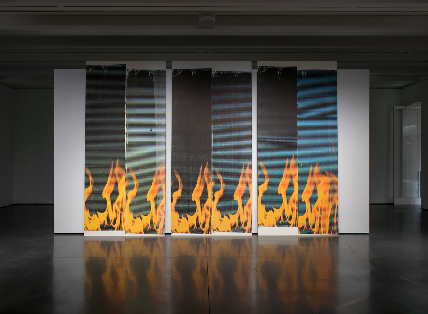 Installation view of works by Wade Guyton