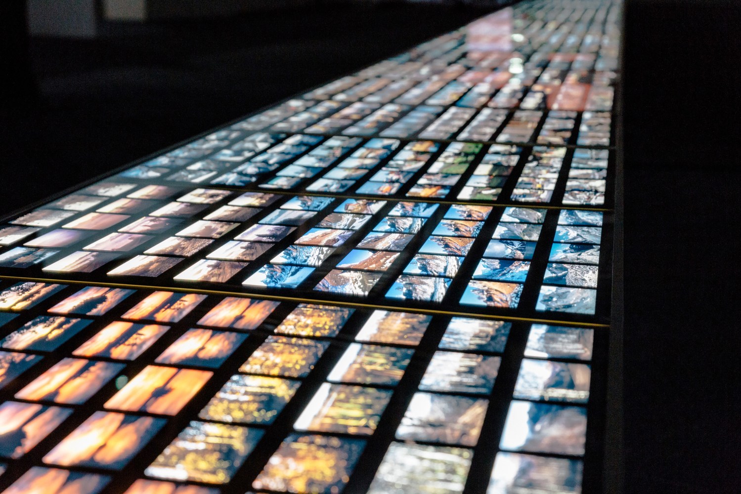 Installation view of images by Peter Fischli David Weiss