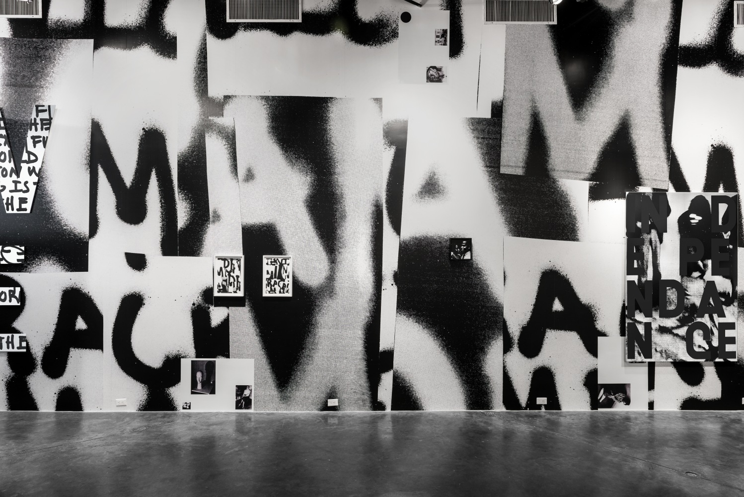 Installation view of paintings by Adam Pendleton