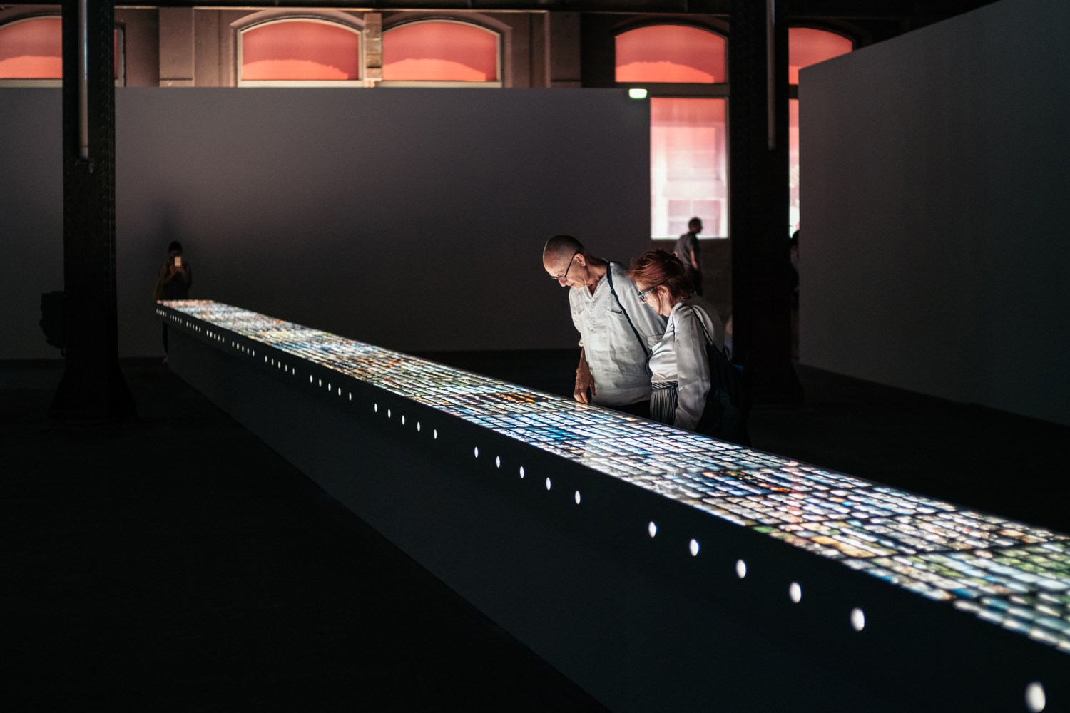 Installation view of images by Peter Fischli David Weiss