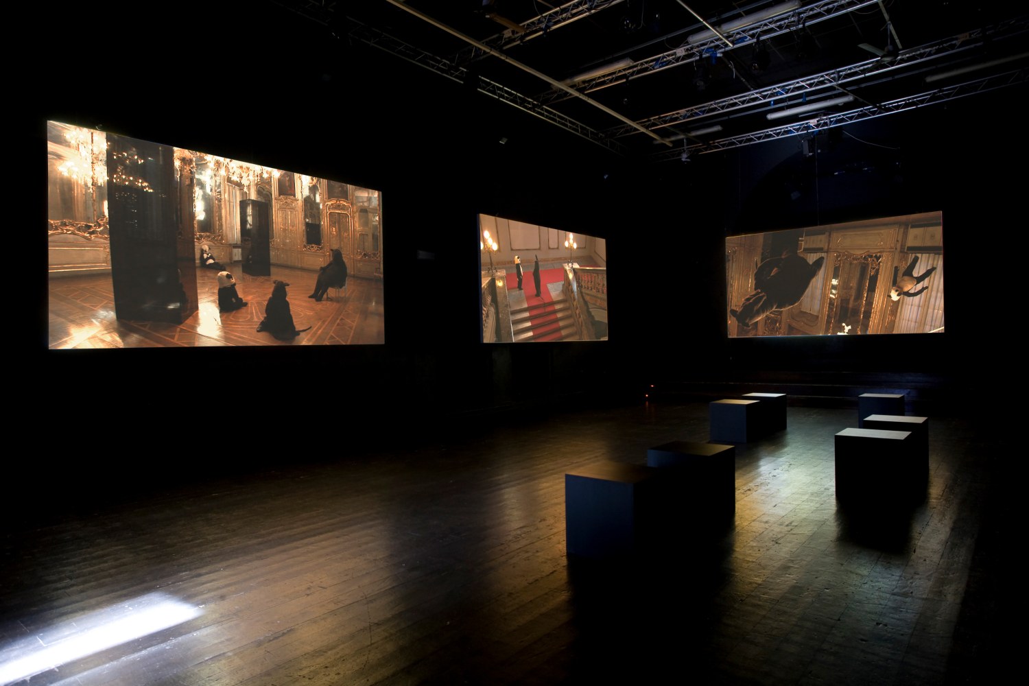 Installation view of video works by Peter Fischli and David Weiss