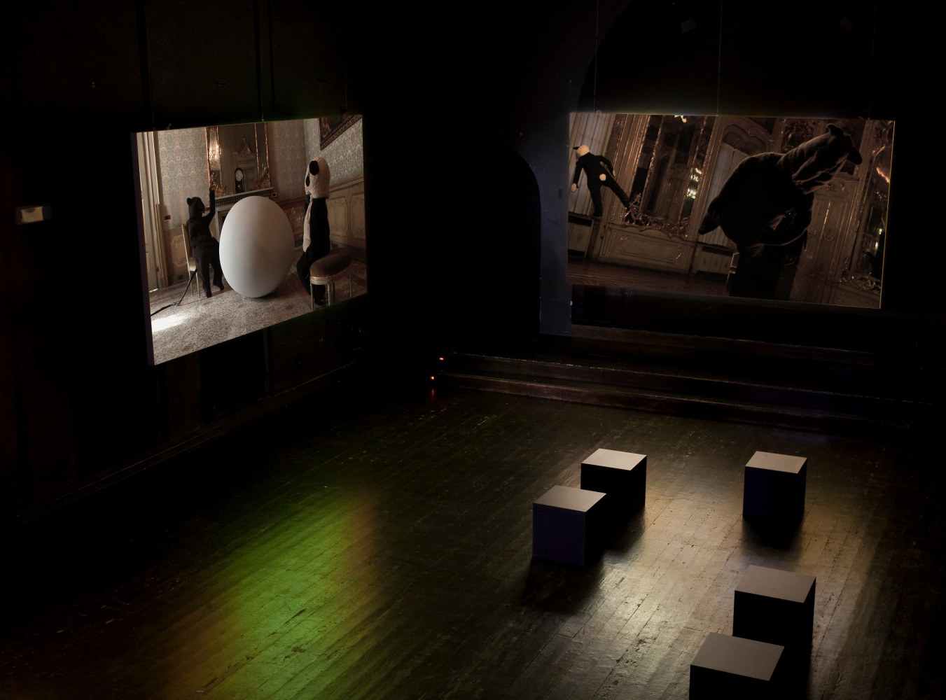 Installation view of video works by Peter Fischli and David Weiss