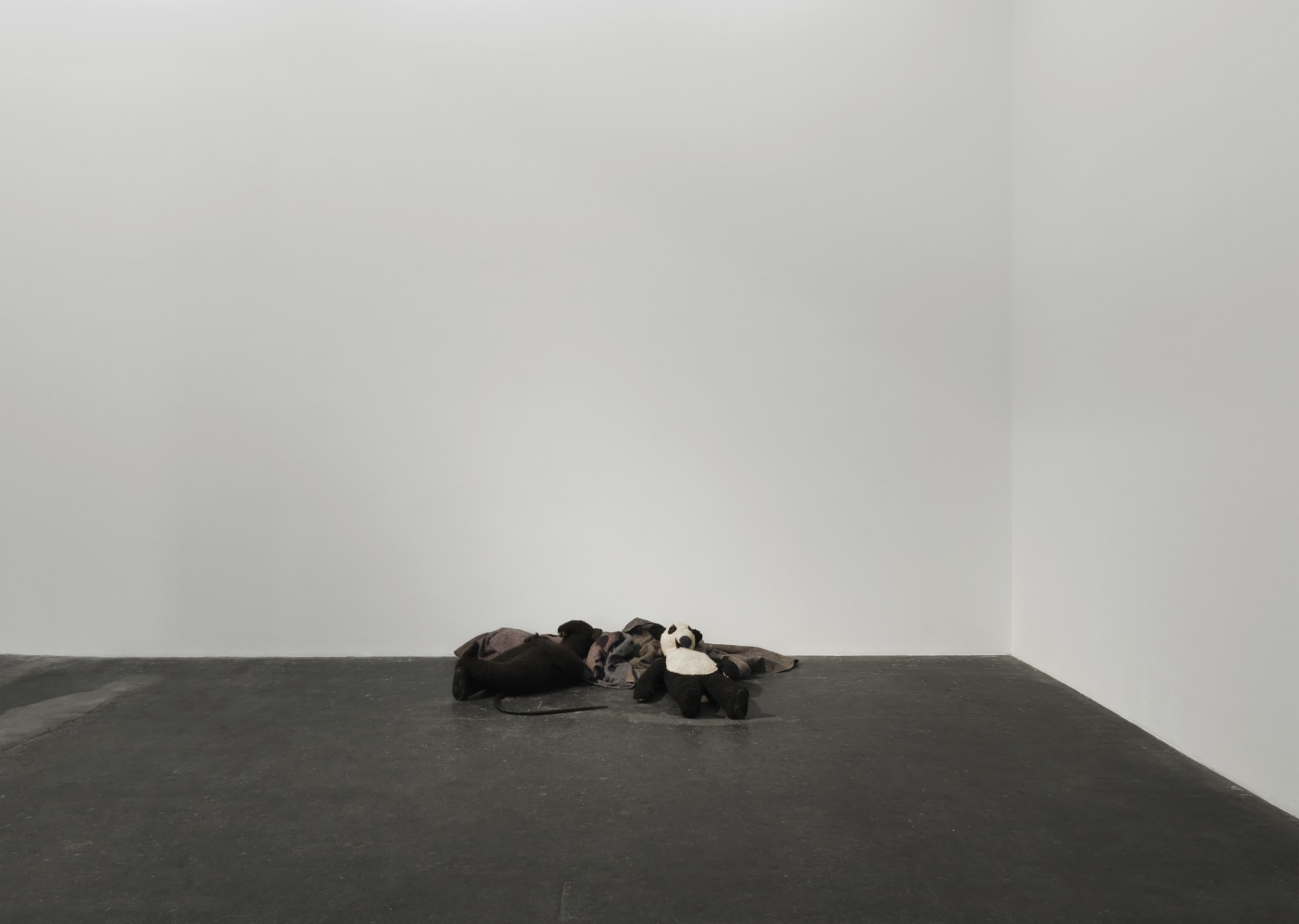 Installation view of Peter Fischli David Weiss film and sculpture exhibition