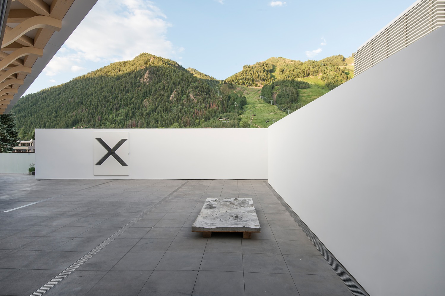 Installation view of sculptures by Peter Fischli and David Weiss and works by Wade Guyton