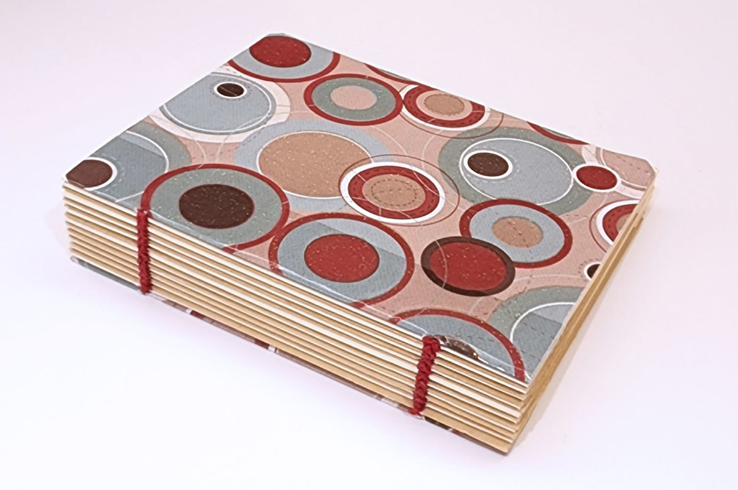 Rosae Reeder, 70's Chic Circle Pattern (Handmade, One-Of-A-Kind Notebook)  5.5&quot; x 4.25&quot;  70's Chic Circle Pattern With Glitter And Texture, Station Binding