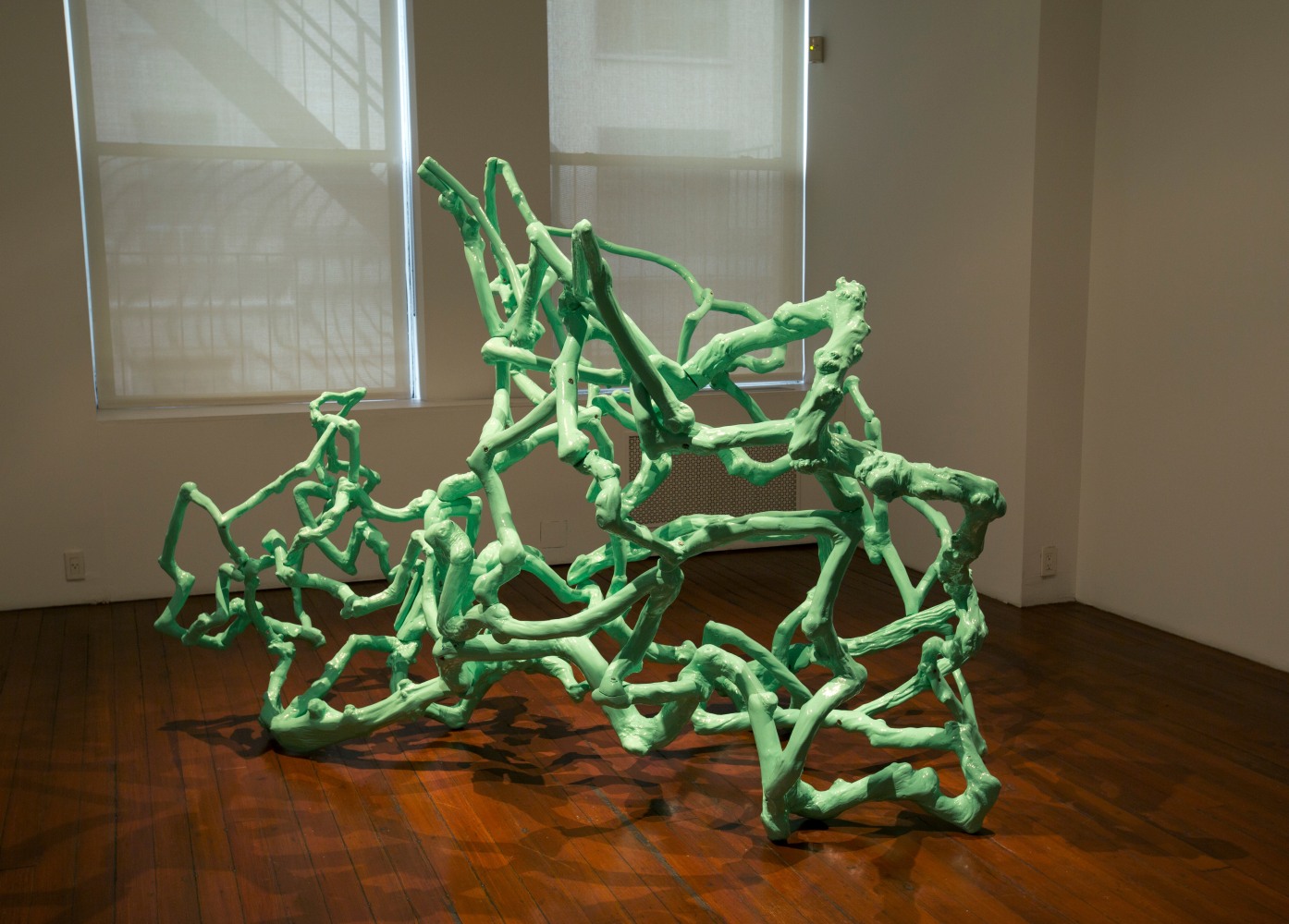 Flight of the butterfly, 2014
Coffee tree wood, automobile paint and stainless steel bolts
67” x 74” x 103"