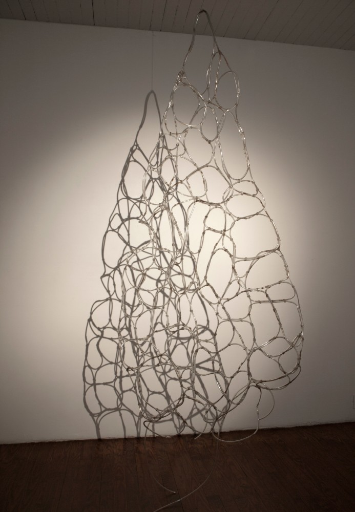 Flow Into Me, 2000
PVC pipe, steel wire
42" x 96" x 18"