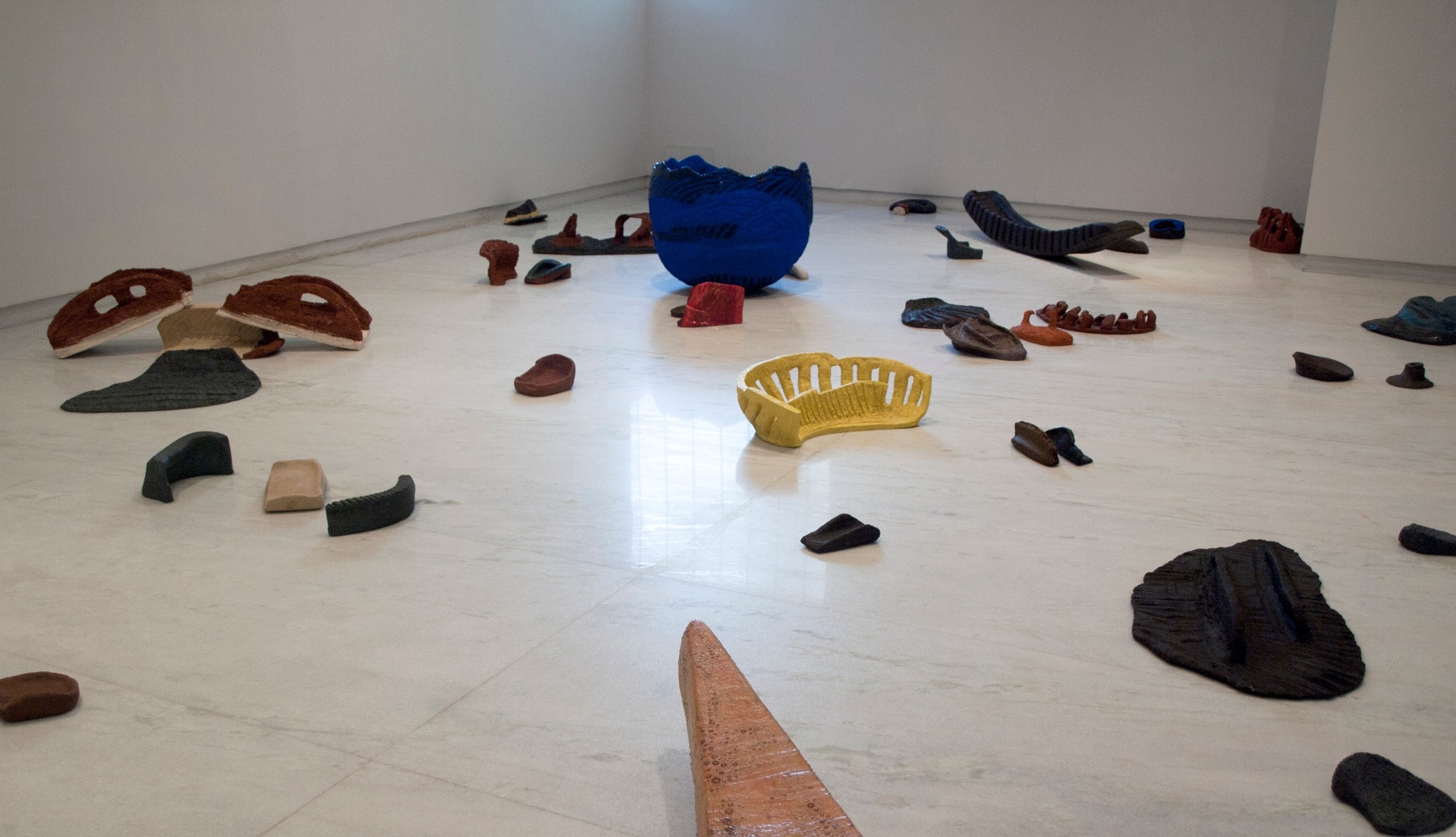All over the place, 1994
Glazed and unglazed ceramic
273" x 180" (Variable, installation in 63 parts)   