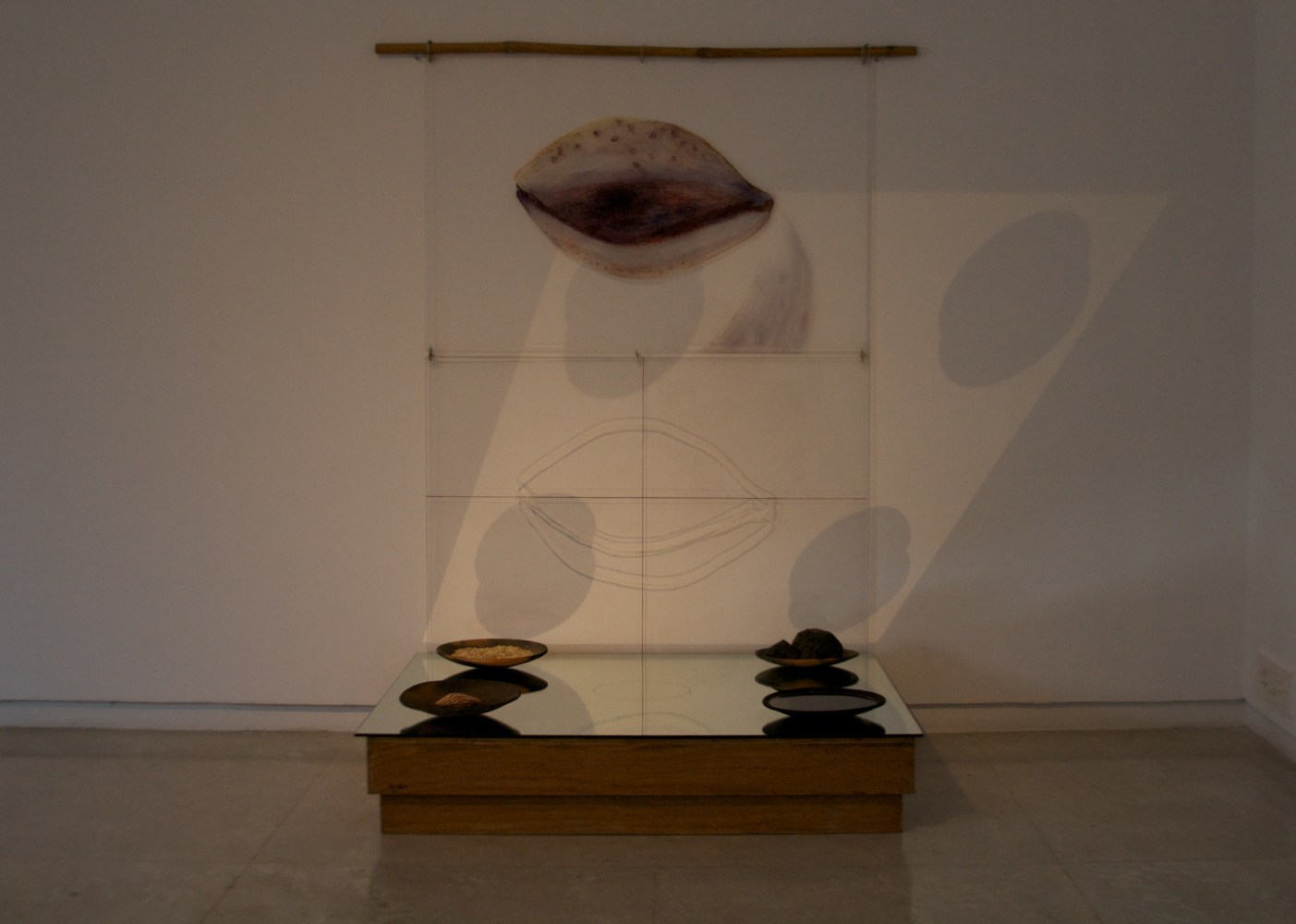 Rummana Hussain
Resonance, 1993
Wood, mirror, paint on acrylic, plates, rice, water, rock, and shell
Dimensions variable