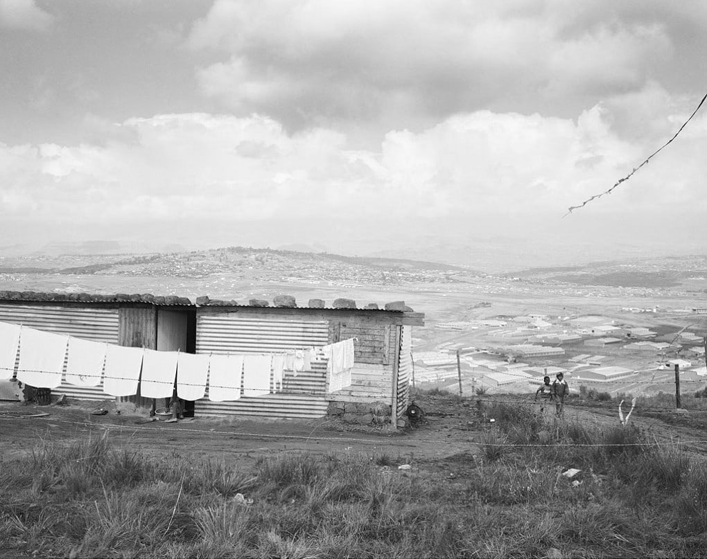 David Goldblatt Kite flying near Phuthaditjhaba, Qwa Qwa. 1 May 1989 (4_5951), 1989 Silver gelatin print on fibre-based paper Image: 36.2 x 45.4 cm (14.3 x 17.9 in.) STD 10/10
