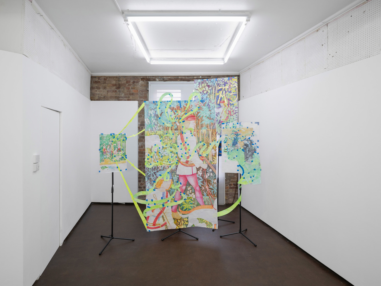 Sam Keogh, Pages from The Hunters Enter the Woods Cartoon, 2024, acrylic, watercolour, coloured pencil and gold leaf on 70gsm acid-free layout paper, masking tape, gaffer tape, cardboard cutouts, mic stands. Dimension variable. Photo: Ollie Harrop