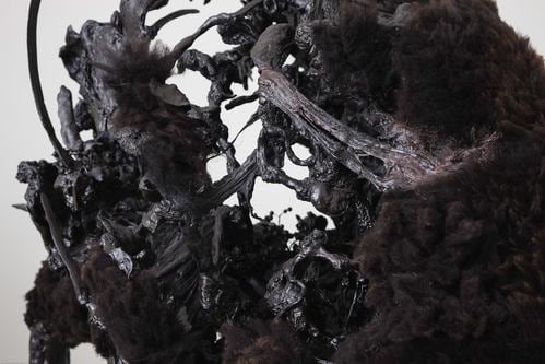 Eoin Mc Hugh,&amp;nbsp;The ground itself is kind, black butter, 2014,&amp;nbsp;black sheepskin, wax, steel and mixed media,&amp;nbsp;224 x 122 x 190 cm / 88.2 x 48 x 74.8 in