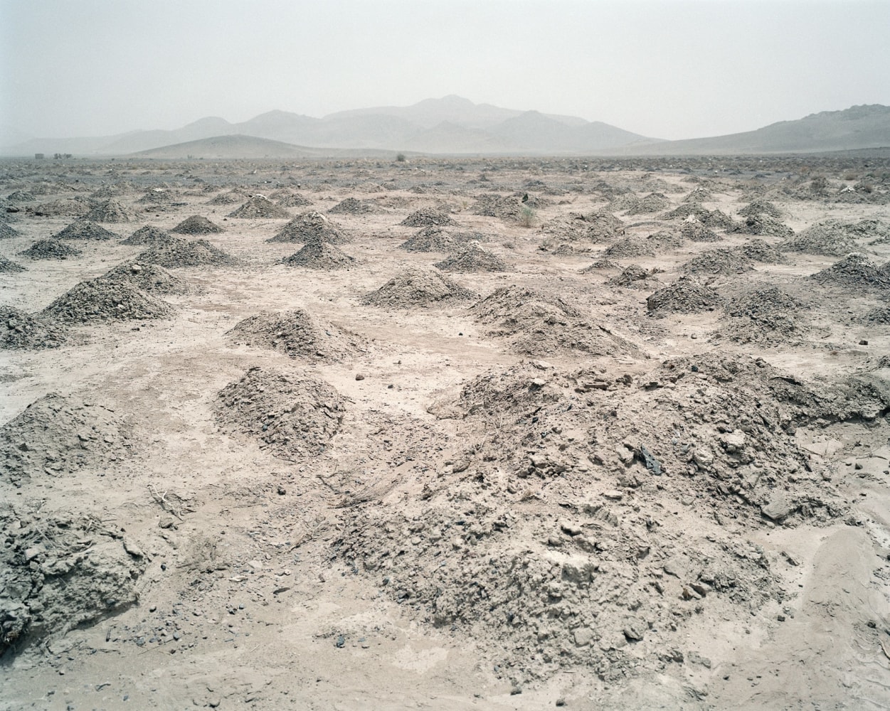 Paul Seawright&amp;nbsp;
Mounds, 2002
c-print on fuji crystal paper mounted on aluminium, framed, edition of 6
121.9 x 147.3 cm / 48 x 58 in
Collection of Imperial War Museum, UK