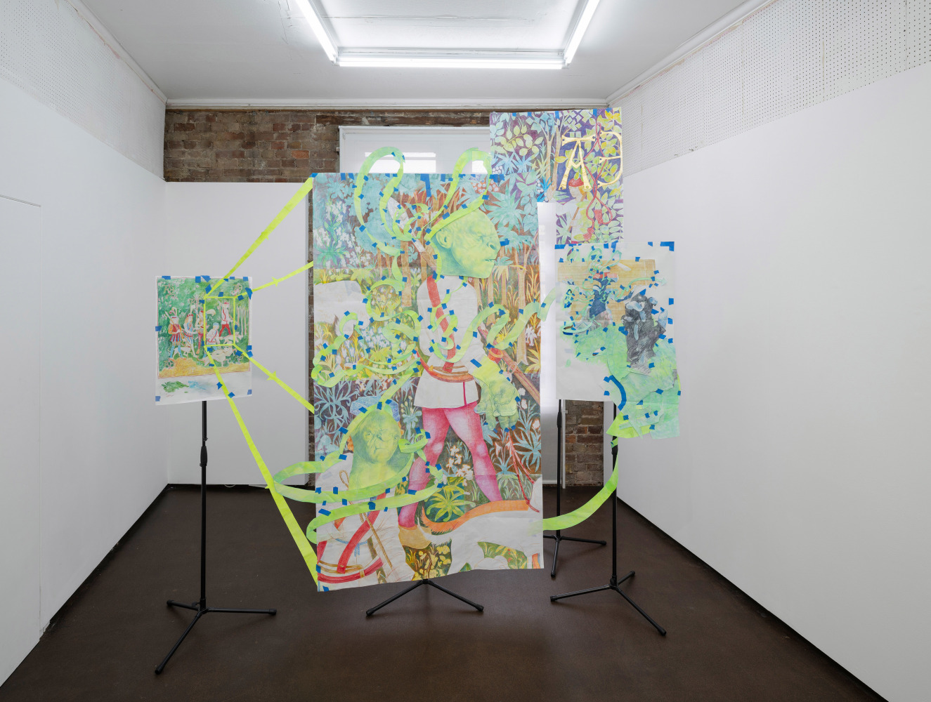 Sam Keogh, Pages from The Hunters Enter the Woods Cartoon, 2024, acrylic, watercolour, coloured pencil and gold leaf on 70gsm acid-free layout paper, masking tape, gaffer tape, cardboard cutouts, mic stands. Dimension variable. Photo: Ollie Harrop