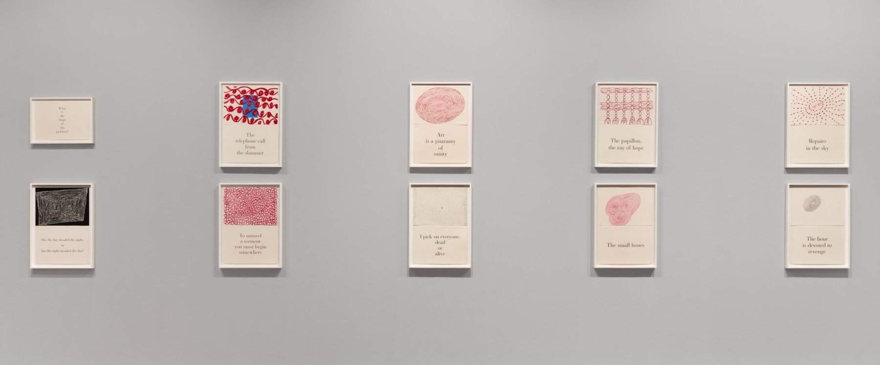 An image of the Louise Bourgeois suite of 9 diptychs with 1 title page, each in a white frame mounted on a grey wall