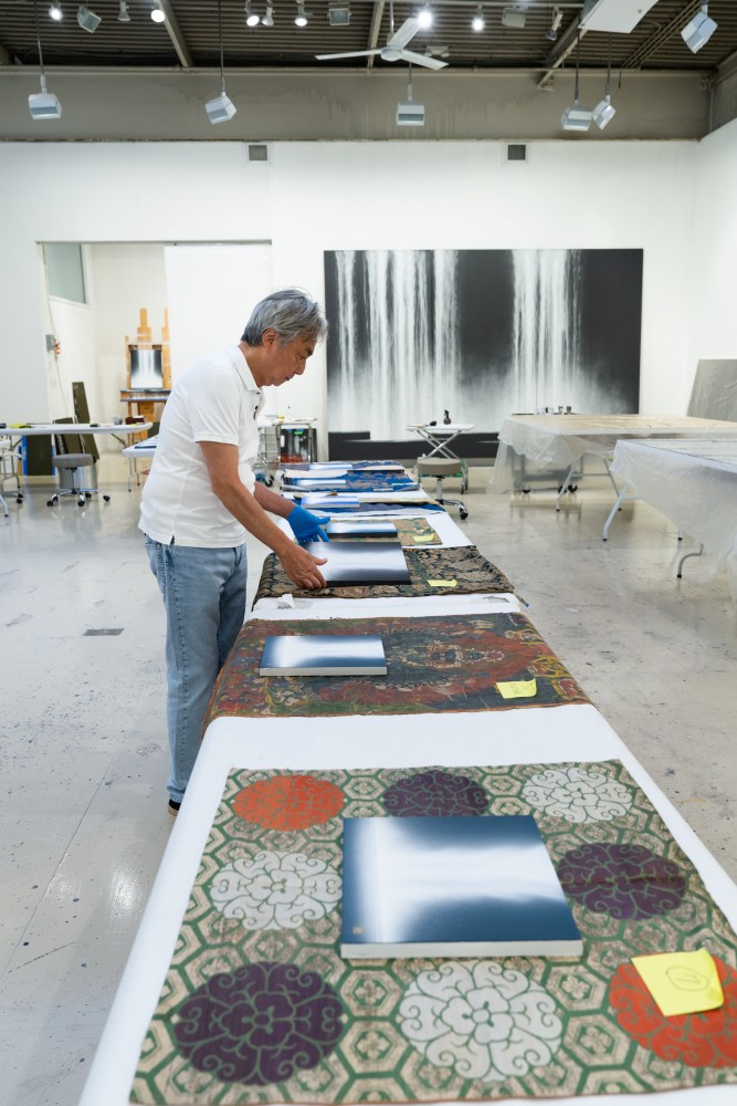 As I am working on the pieces, I am also thinking about the balance between the fabric and the work.&amp;nbsp; Here, I am holding up the pieces to the fabric. The antique fabrics that I am using will be just an ordinary rag.&amp;nbsp; But by incorporating it into the work, it is given new life.