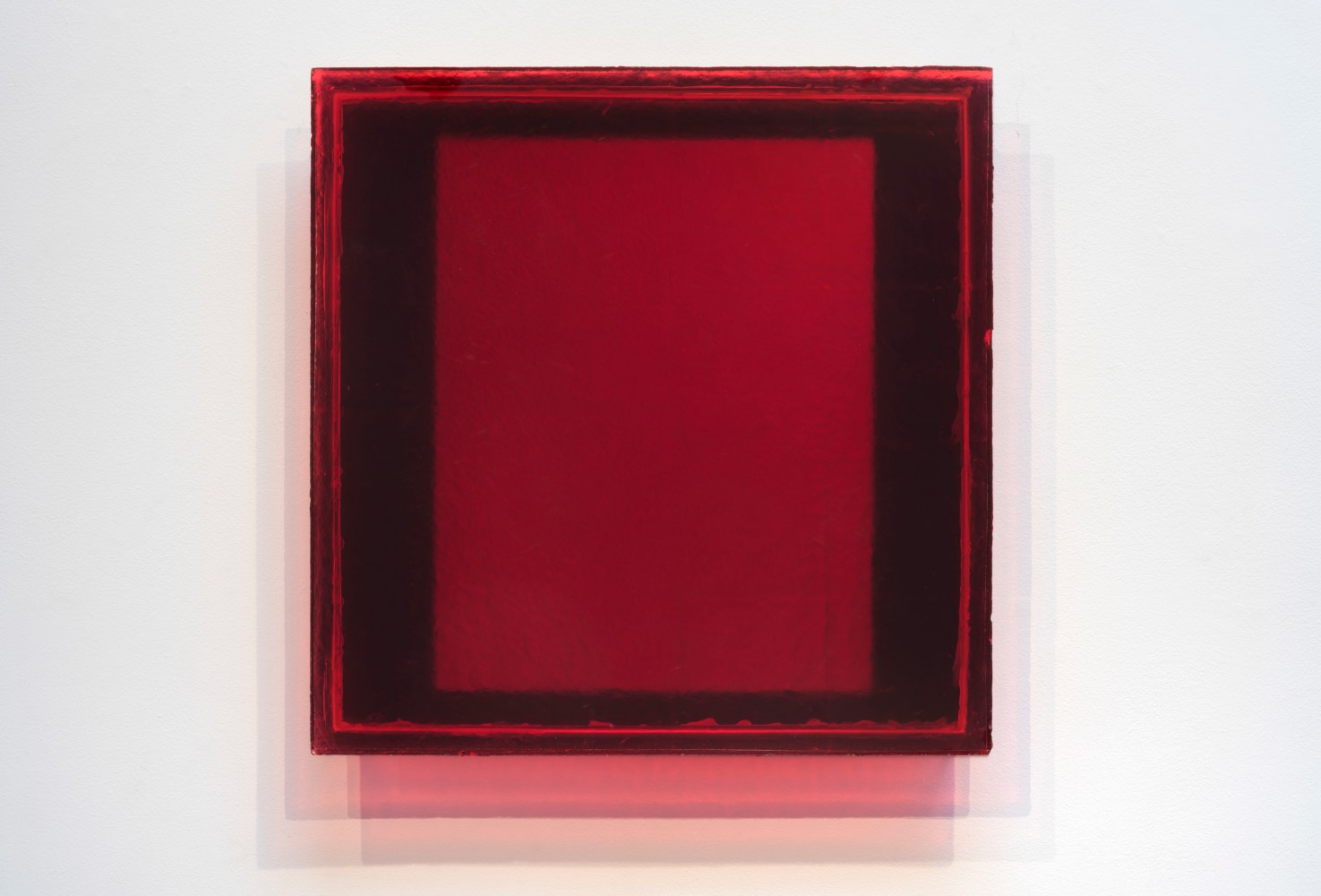 Ron Cooper (b. 1943), Red Mirror Square, 1982, transparent polyester resin, plexiglass, pigment and mirror, 24 x 24 x 3 5/8 inches;  61 x 61 x 9.2 centimeters LSFA# 14885