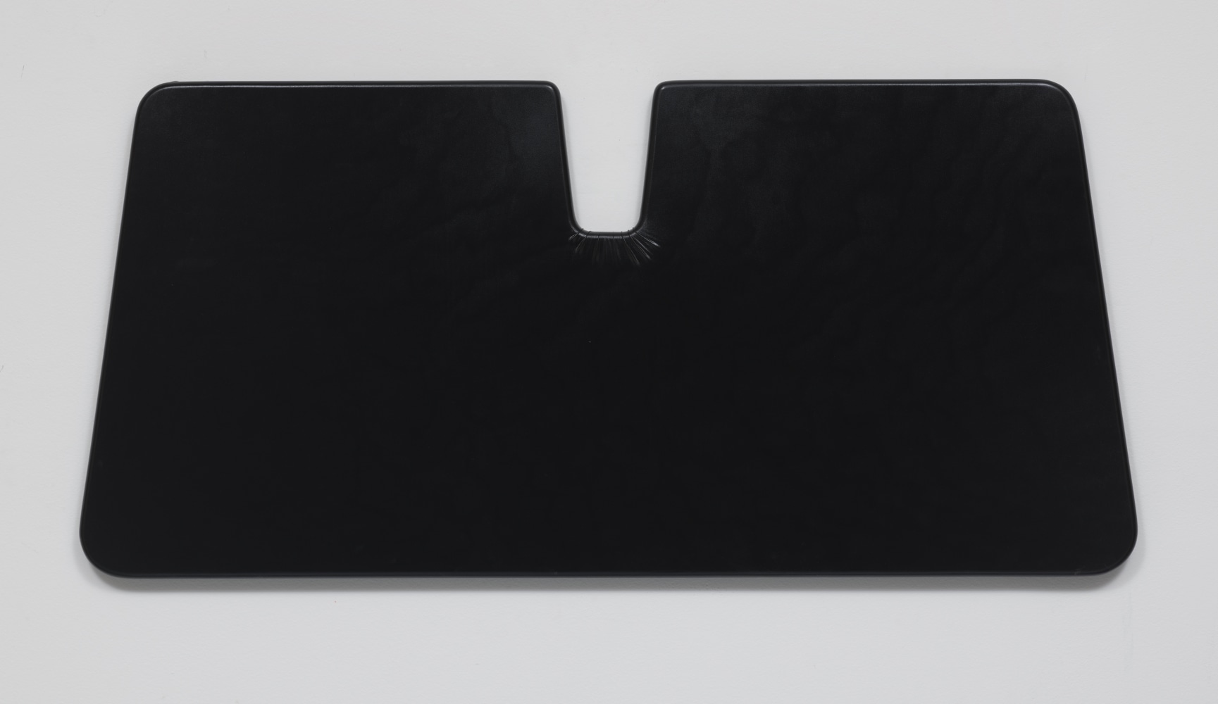 Dominic Samsworth
Sun visor, 2020
Black lycra on wooden shaped panel
26.77h x 58.66w x 1.18d in
68h x 149w x 3d cm