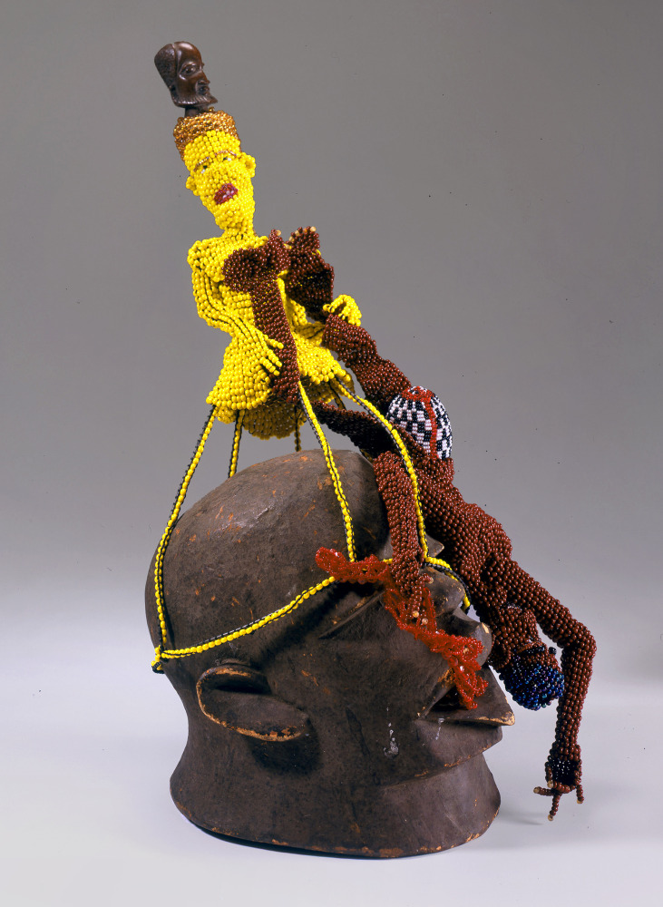 Joyce J. Scott

Yaller Girl,&amp;nbsp;2006

Peyote stitched glass beads, mask, wood, mixed media

25 x 10 x 9 in. (63.5 x 25.4 x 22.9 cm)

Collection of Chrysler Museum of Art, VA