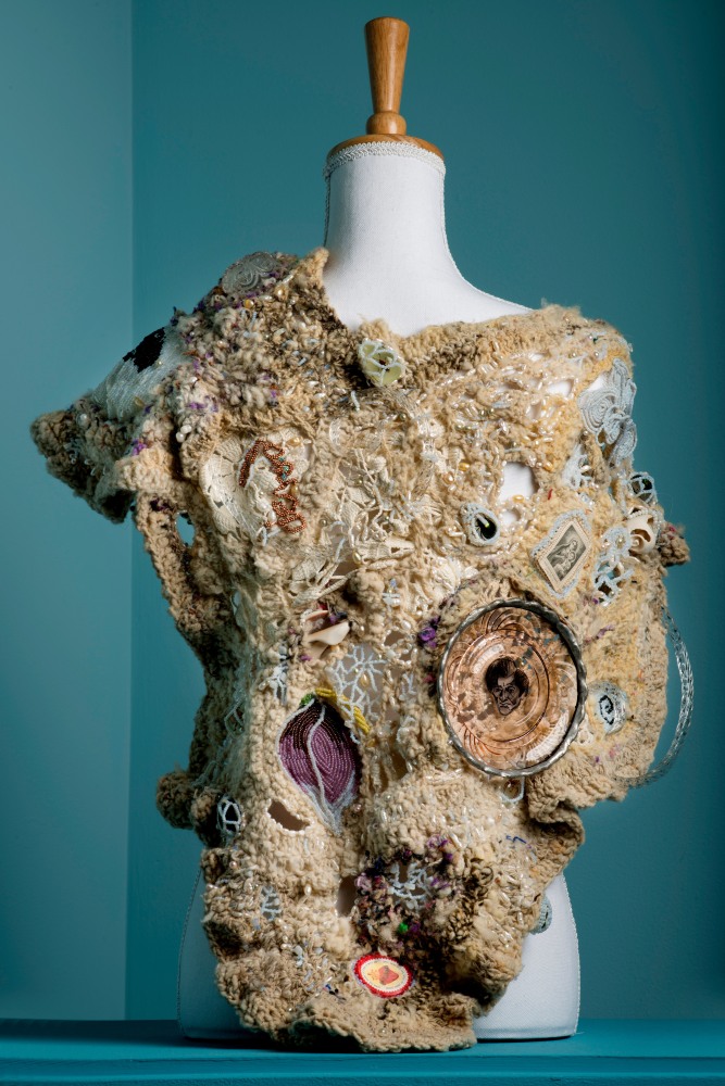 Joyce J. Scott

Shawl,&amp;nbsp;2017

Artist-spun crochet wool, pearls, beads, insects cast in resin, mixed media

32 x 32 x 2 1/2 in. (81.3 x 81.3 x 6.3 cm)

Scot-1195-C