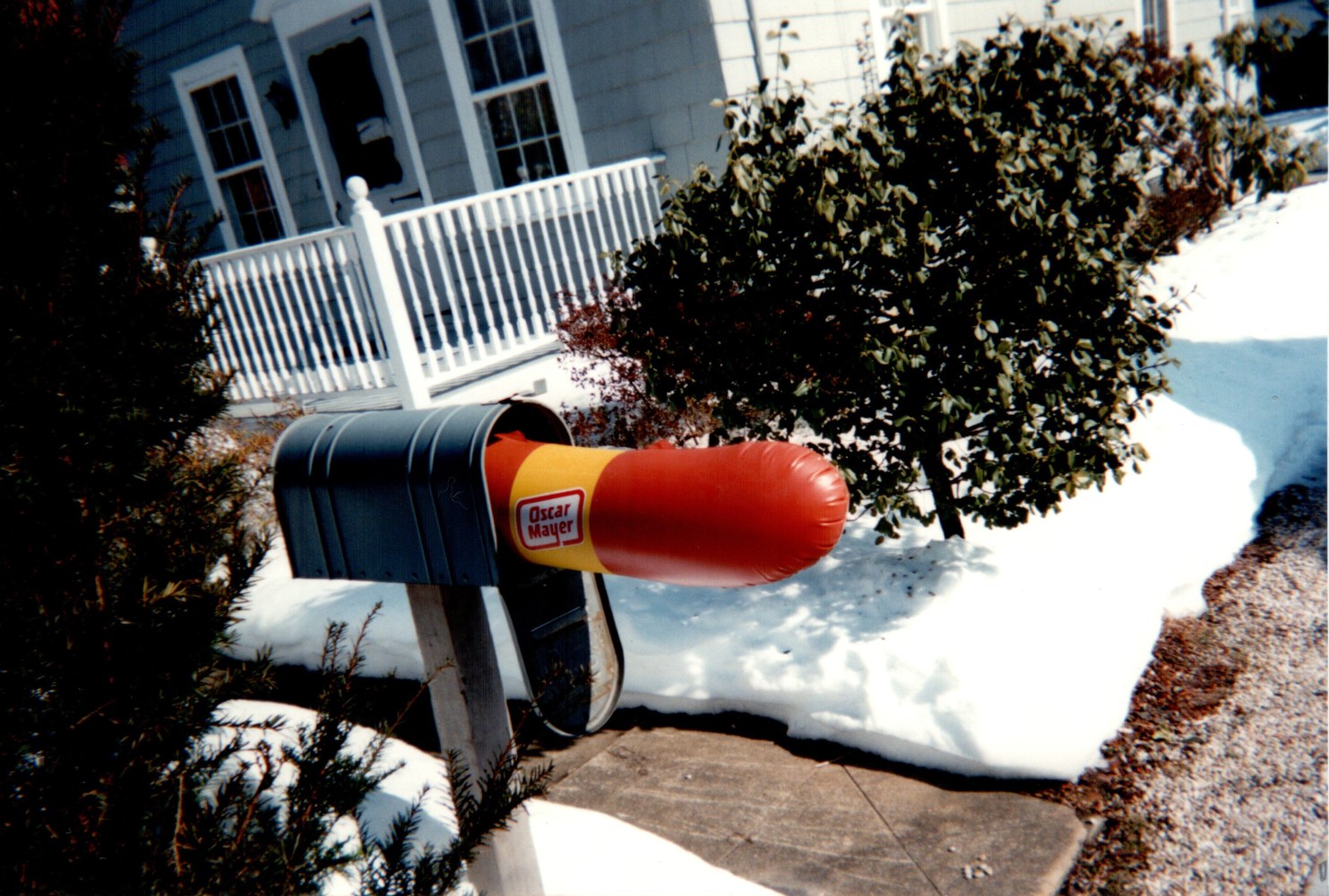 Ray Johnson, Untitled (Oscar Mayer Weiner in Mailbox), circa 1992-94, Commercially processed chromogenic print, 6 x 4 inches, Collection of The Morgan Library &amp;amp; Museum