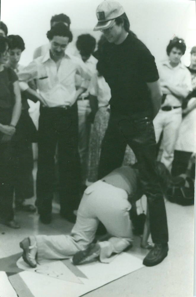 A Ray Johnson performance during which he asks participants to walk through each others&amp;#39; legs, 1980. Photographer unknown.
