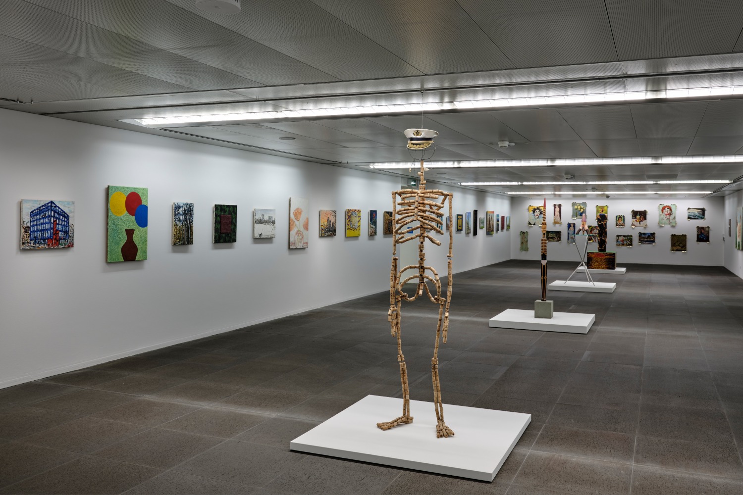 Installation view of paintings and sculptures by Jean-Frédéric Schnyder